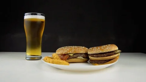 Burger Floating in the air on table Stock Footage 77645829