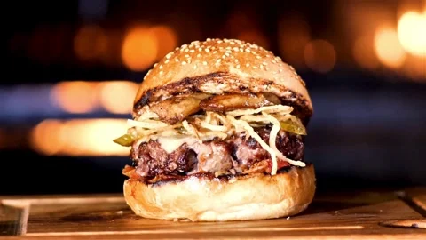 Burger with fresh iceberg cabbage, Macro background. Close-up view, fast food, Stock-Footage 336579630