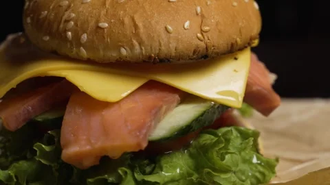 Burger with fresh red fish Stock Footage 297004267