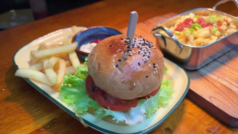 Burger fries salad Crispy, breaded chicken double burgers with vegetables and Stock Footage 275881902