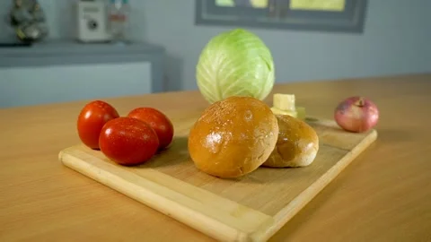 Burger ingredients kept together on a kitchen counter for breakfast Stock Footage 158415029
