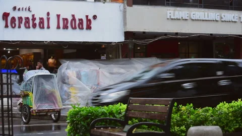 Burger King restaurant front view in Yogyakarta city Stock Footage 151164205