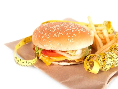 Burger with measure tape Stock Photos