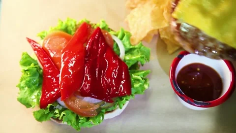 Burger with meat and vegetables. Video stock 130863846