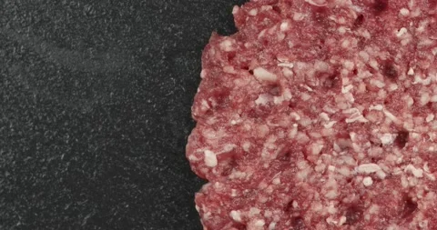 Burger patty on copy space closeup rotating Stock Footage 144662944