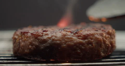 Burger patty is fried on fire Stock Footage 310958188