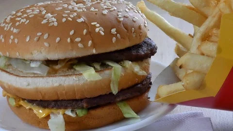 Burger with pomes on the table Stock Footage 92689912