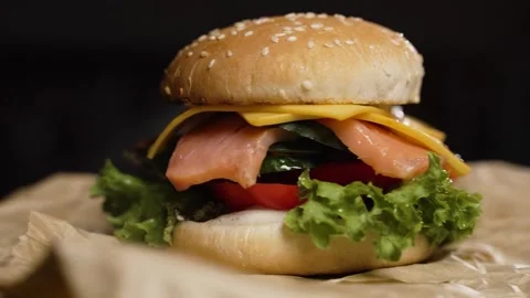 Burger with red fish Stock Footage 297004235