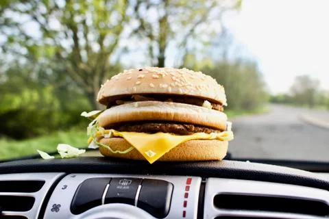 Burger on the road Stock Photos