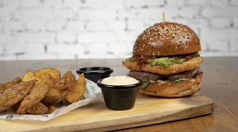 Burger with sauce Stock Photos