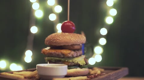 Burger set rotate on a board Stock Footage 62656647