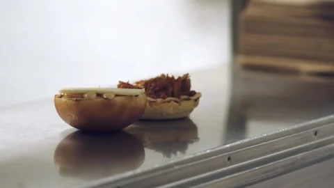 Burger waiting on a counter Stock Footage 109350445