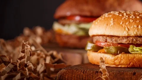 Burger on wood background Stock Footage 72672351