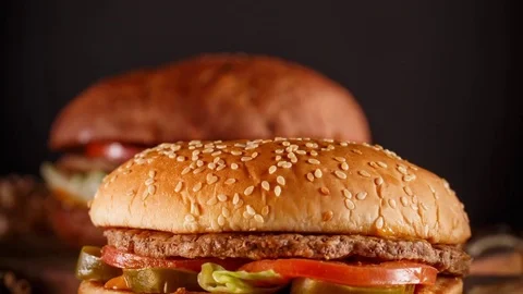 Burger on wood background Stock Footage 72672353