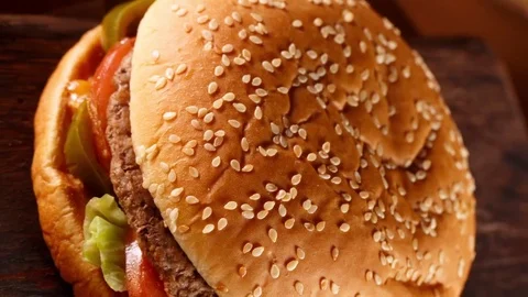 Burger on wood background Stock Footage 72672364