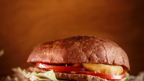 Burger on wood background Stock Footage 72672372