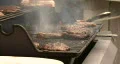 Burgers On A Flaming Grill 01 HD Footage