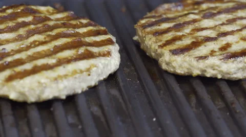 Burgers on the grill Stock Footage 53145716