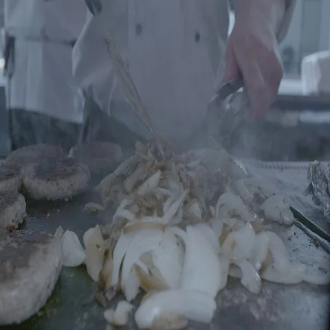 Burgers on the grill Stock Footage 69294194