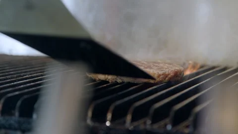 Burgers on the grill Stock Footage 92177341