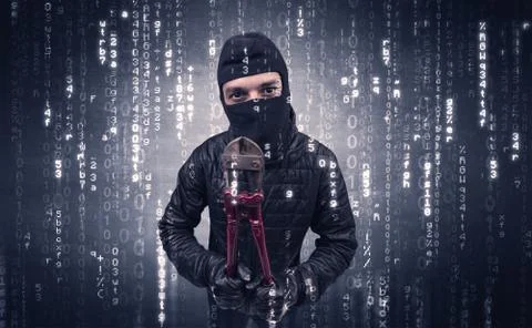 Burglar in action with encoded concept. 写真素材