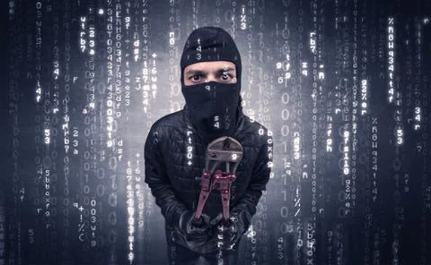 Burglar in action with encoded concept. 写真素材