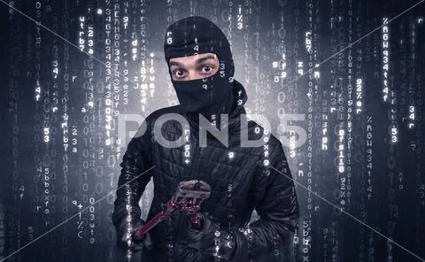 Burglar in action with encoded concept. Stock Photos
