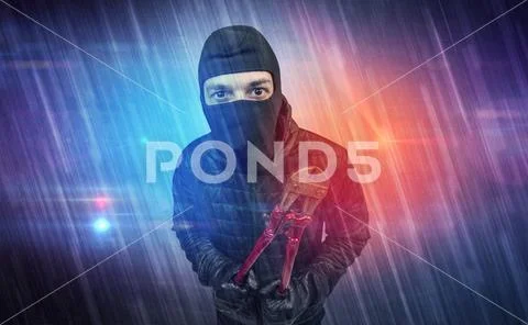 Burglar in action. Stock Photos