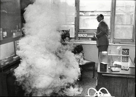 Burglar Alarm In Electric Fire Causes A Cloud Of Smoke During Demonstration 1966 Stock Photos