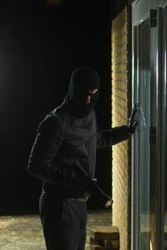 Burglar flashlight Stockfoto's