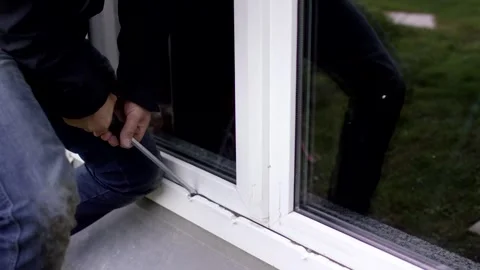 Burglar Prying Open a House Window with a Tool, Crime Scene, Close Up Видео 341527176