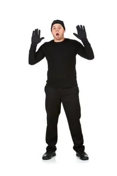 Burglar: robber with hands up Stock Photos