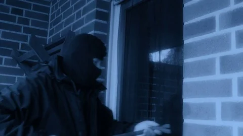 Burglar at work with a crowbar multi angle Stock Footage 74228582
