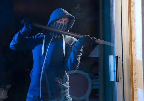 Burglar at work Stock Photos