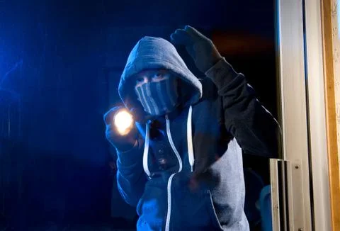 Burglar at work Stock Photos