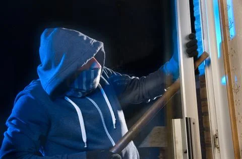 Burglar at work Stock Photos