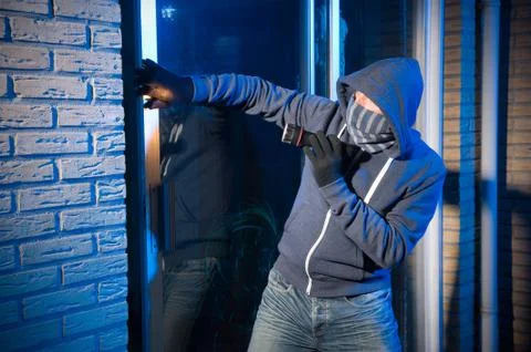 Burglar at work Stock Photos