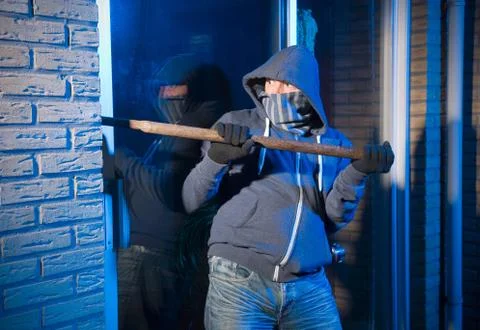 Burglar at work Stock Photos