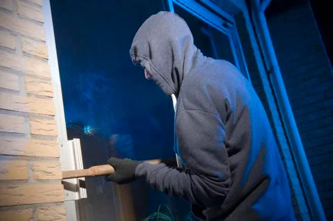 Burglar at work Stock Photos