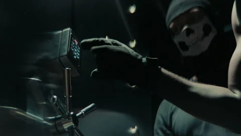 Burglars entering the code to access the vault Stock Footage 262331964