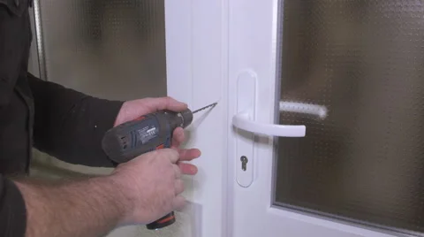 Burglary with drill machine. Einbruch mit Bohrmaschinen Stock Footage 56750183