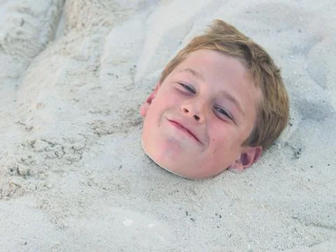 Buried in the sand Stock Photos