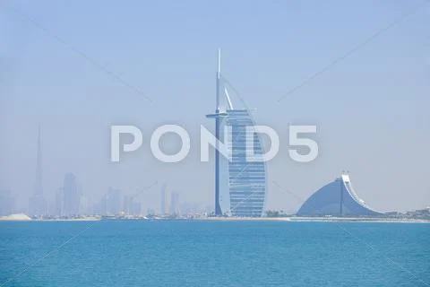 Burj Al Arab And Jumeirah Beach Hotel With Burj Khalifa In The Background,