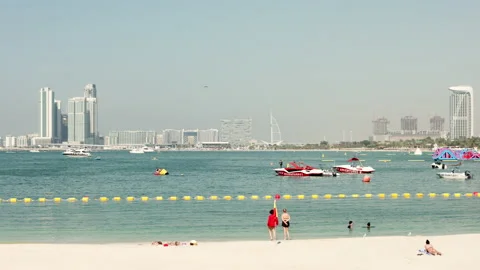 Burj Al Arab Hotel seen from Marina Beach, Dubai, UAE Stock Footage 220107761