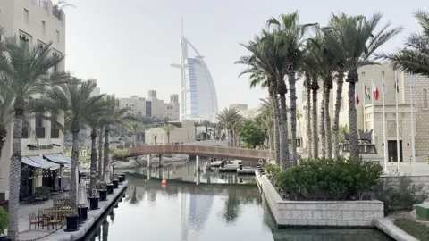 Burj al arab view from Souk al Madinat Jumeirah Dubai  Stock Footage 233857040