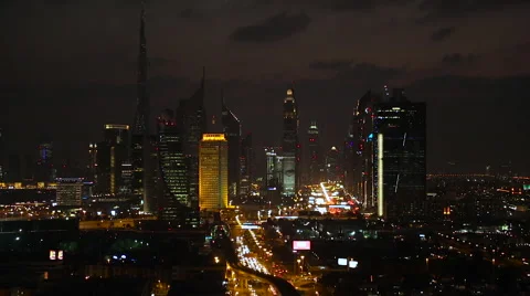 Burj Al Khalifa, Sheikh Zayed Road skyline at dusk Stock Footage 62784094