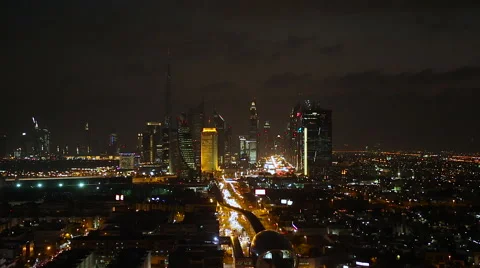 Burj Al Khalifa, Sheikh Zayed Road skyline at dusk Stock Footage 62784101