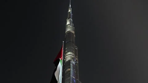 Burj Khalifa in evening with UAE flags Stock Footage 252254566