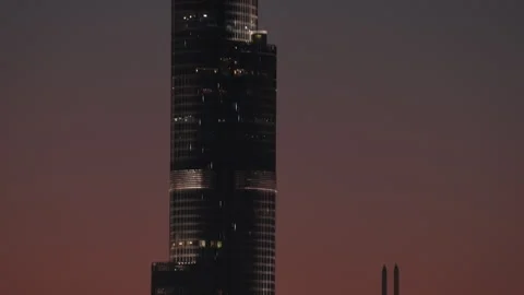 Burj Khalifa rises above Emaar in Dubai UAE Stock Footage 344965011