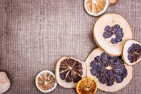Burlap background  apple orange Stock Photos